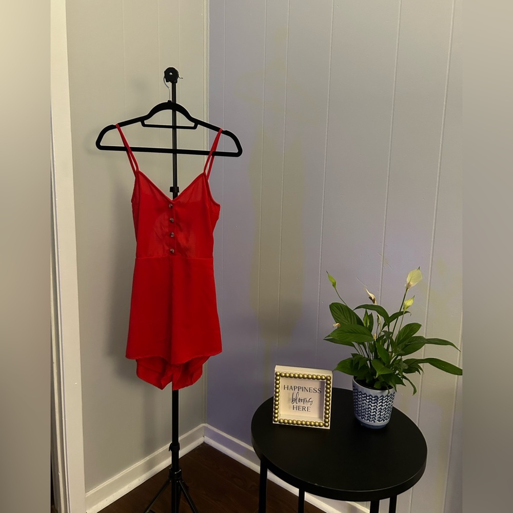 Red playsuit/jumper/romper